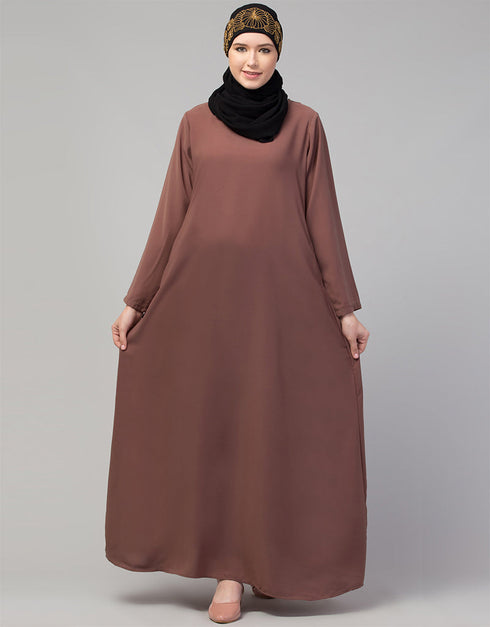 Trendy Abaya made from Nida fabric with a flared hem for a feminine touch In Color Light brown